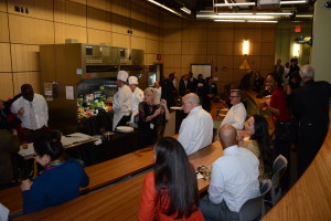Guests admiring the NECAT teaching kitchen auditorium, while celebrity chefs, NECAT chefs and students prepare for the Culinary Competition - Photo Credit: Cape Cod Aerial Photography